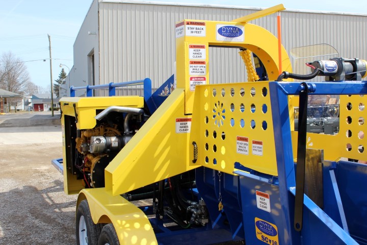 Firewood Processor with a Sawdust Chute